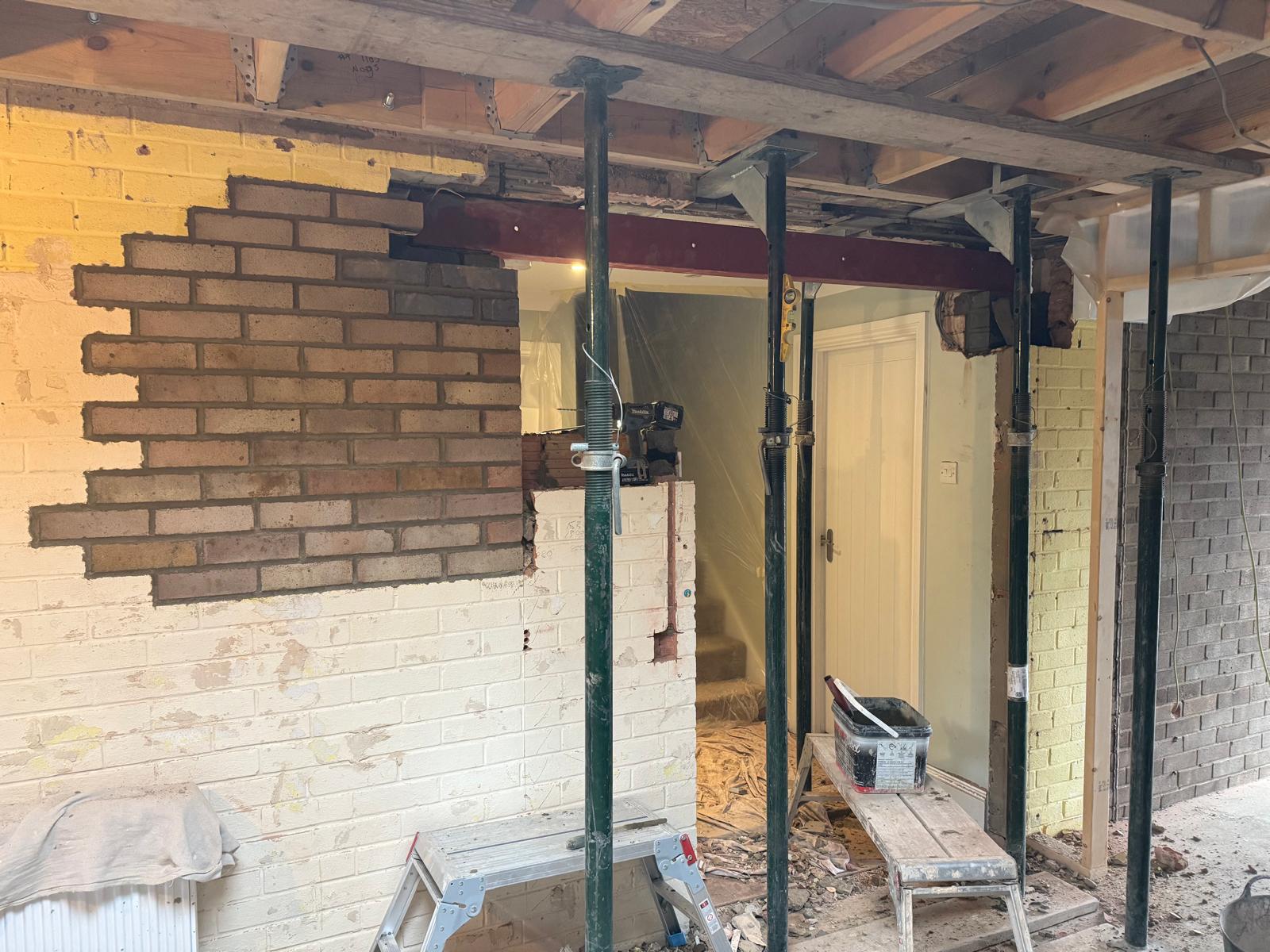 RSJ beam and acro props — structural garage work